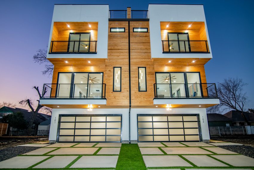 Front elevation at dusk — Munger Avenue · Dallas
