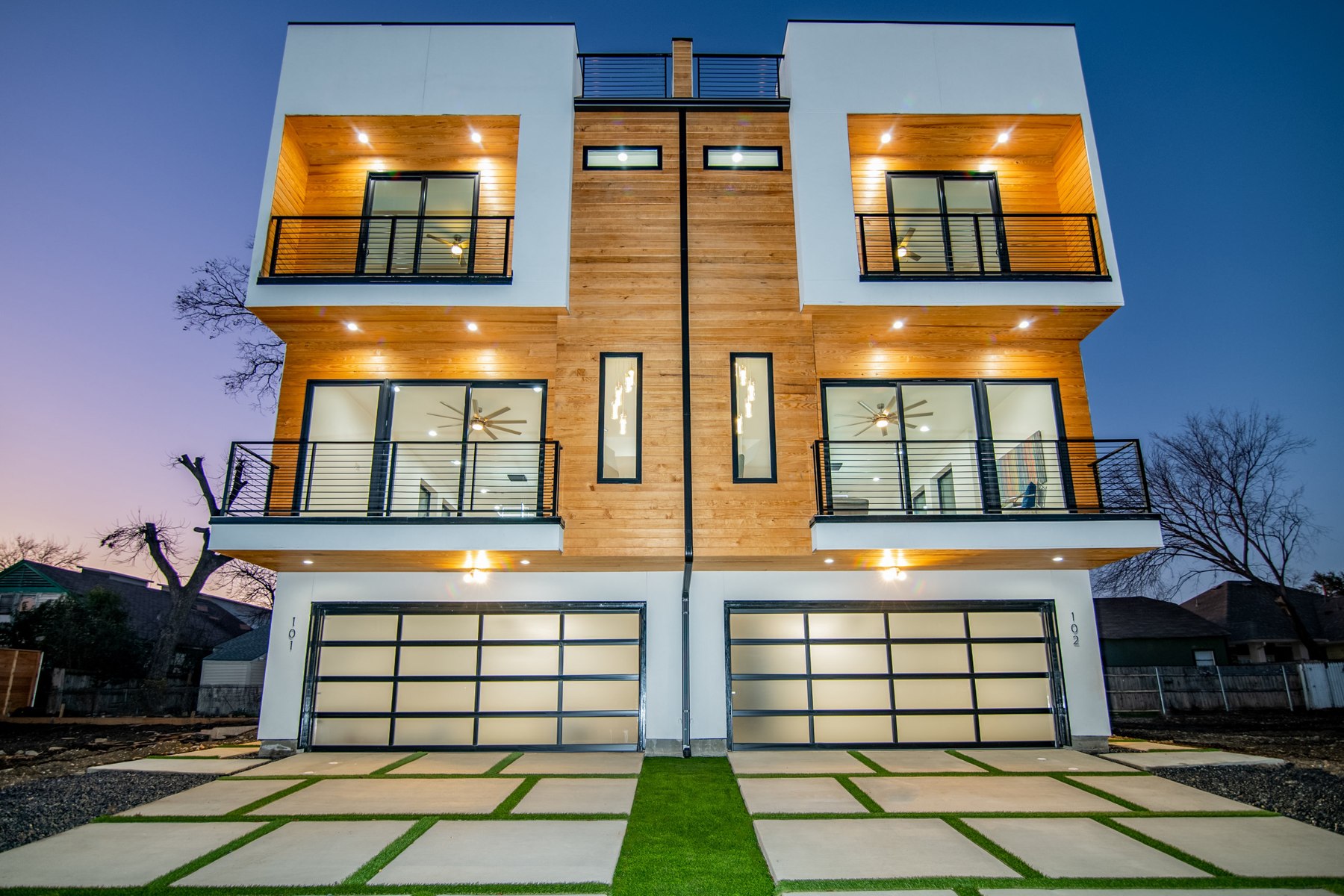 Munger Avenue duplex front exterior at dusk