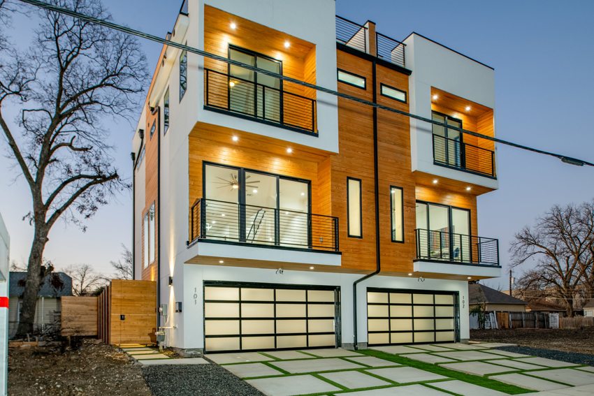 Front facade with warm architectural lighting — Munger Avenue · Dallas