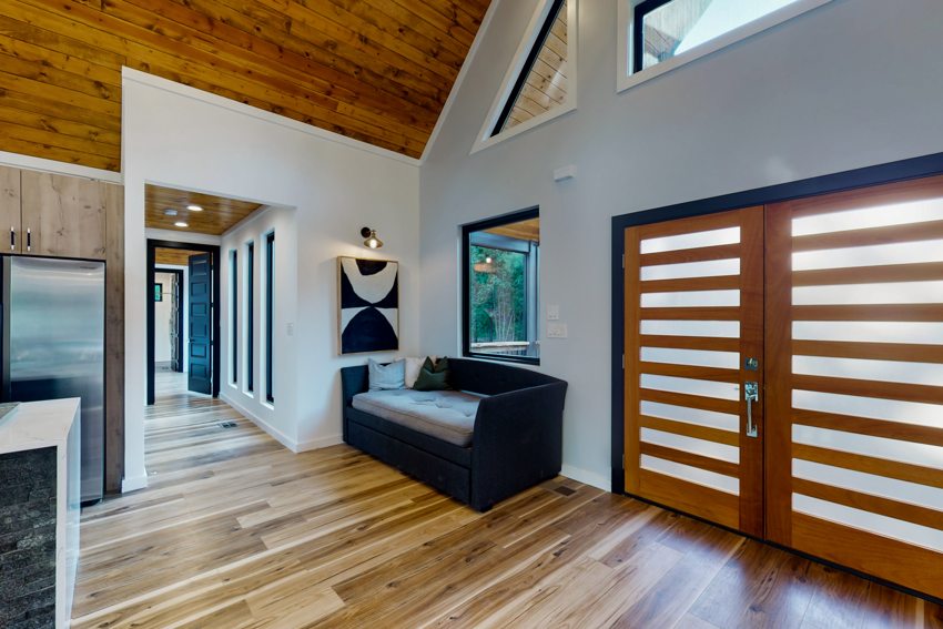 Living area and timber ceiling — Blue Spruce · Broken Bow
