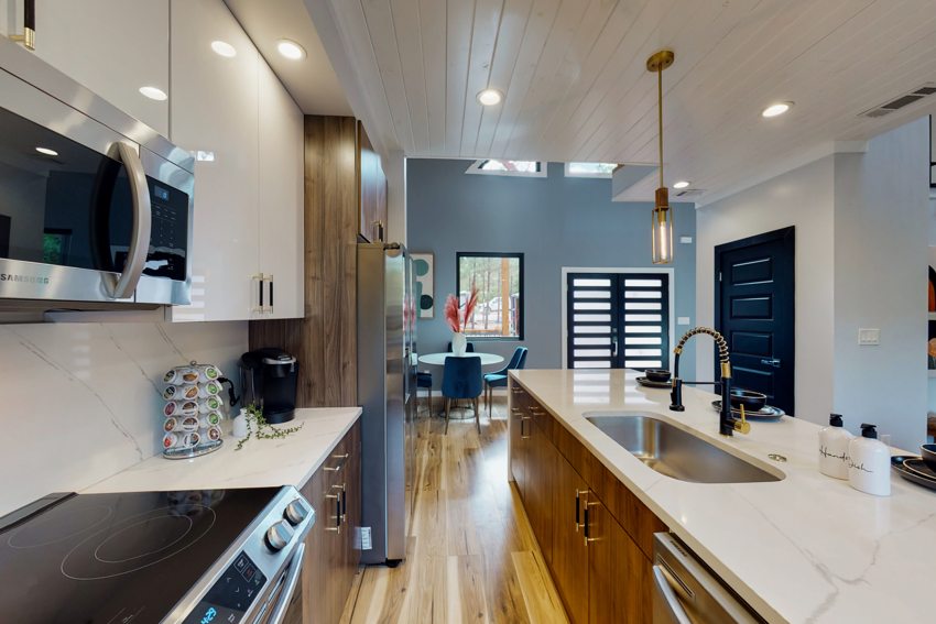 Kitchen cabinetry and island — Blue Spruce · Broken Bow
