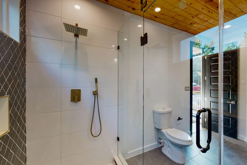 Glass shower and tile detail — Blue Spruce · Broken Bow