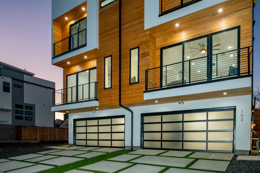 Front facade and illuminated balconies — Munger Avenue · Dallas