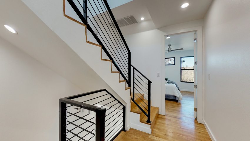 Stair circulation and modern railings — Munger Avenue · Dallas