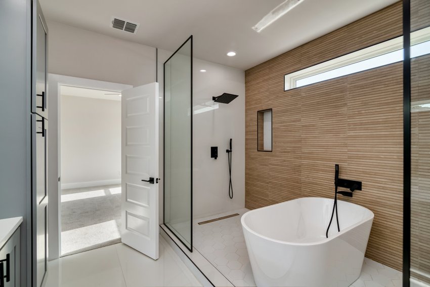 Freestanding tub and glass shower — W. University · Dallas