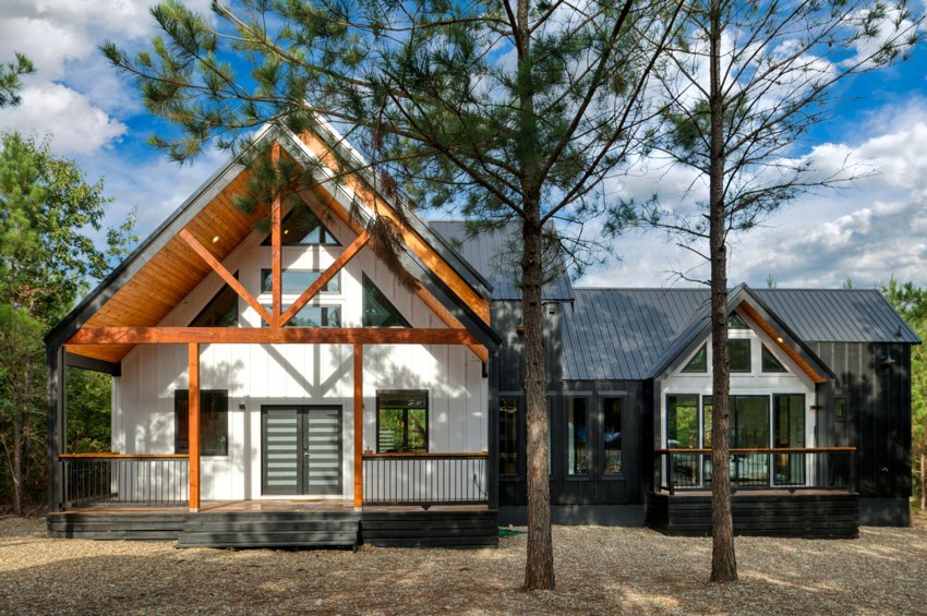 Cabin exterior among the pines — Blue Spruce · Broken Bow