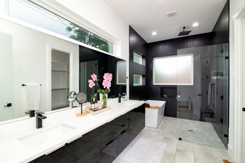 Contemporary bathroom with dark cabinetry — Cowan · Dallas
