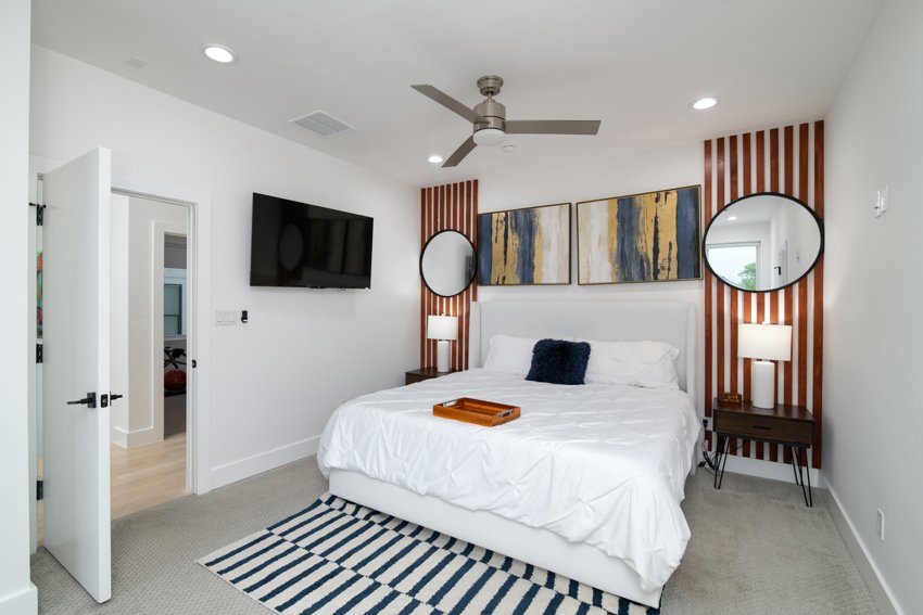 Bedroom with wood feature wall — Cowan · Dallas