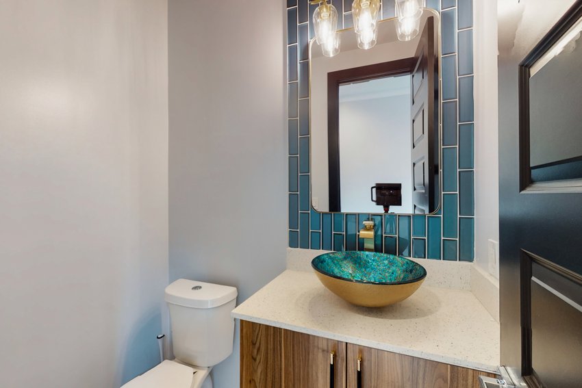 Powder room with statement basin — Blue Spruce · Broken Bow