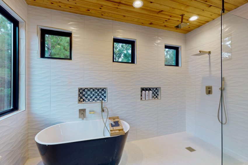 Freestanding tub and wood ceiling — Blue Spruce · Broken Bow