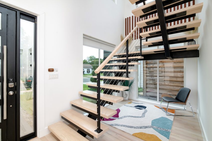 Floating wood stair and open entry — Cowan · Dallas