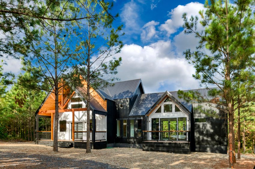 Cabin nestled among mature pines — Blue Spruce · Broken Bow