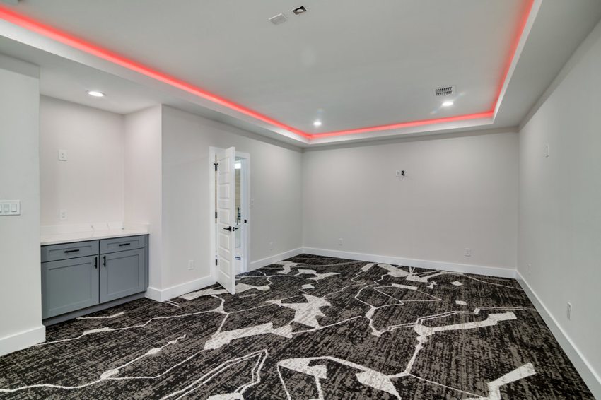 Statement stone and accent lighting — W. University · Dallas